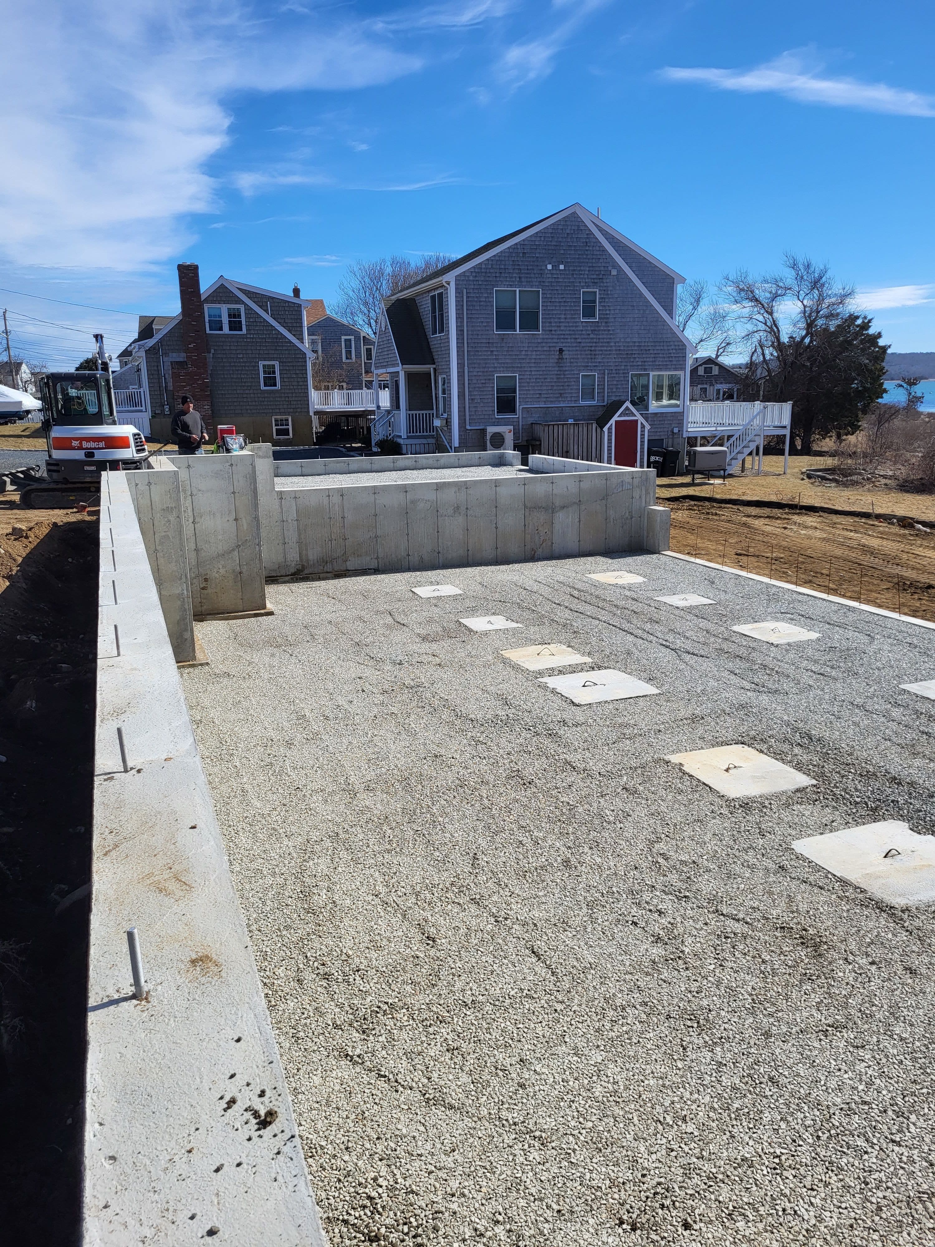 Newly poured gravel spread out at a site. No job too big or small for TD Construction.