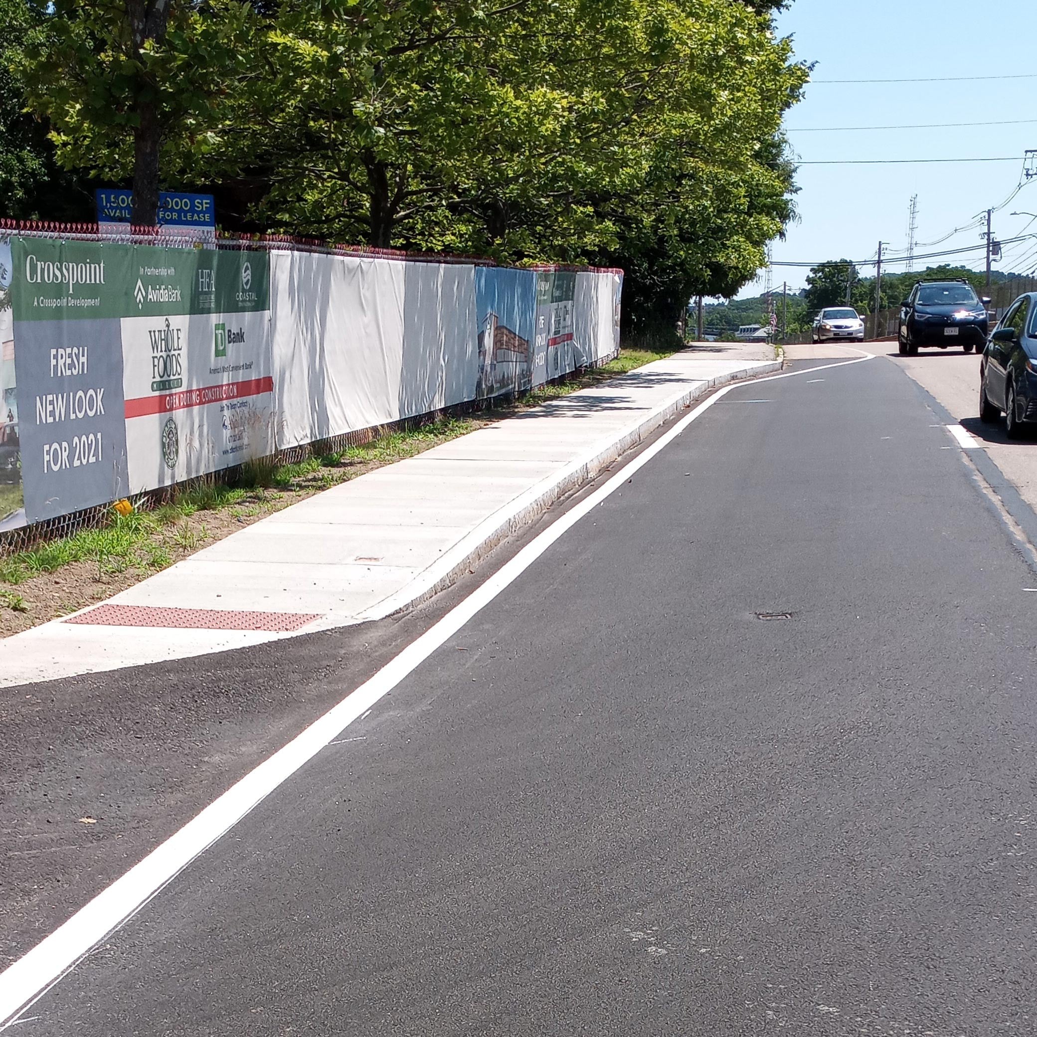 TD Construction installed sidewalks along Rte9 west in Framingham, MA.Sidewalk installation for a new right turn only lane at the Whole Foods Market.